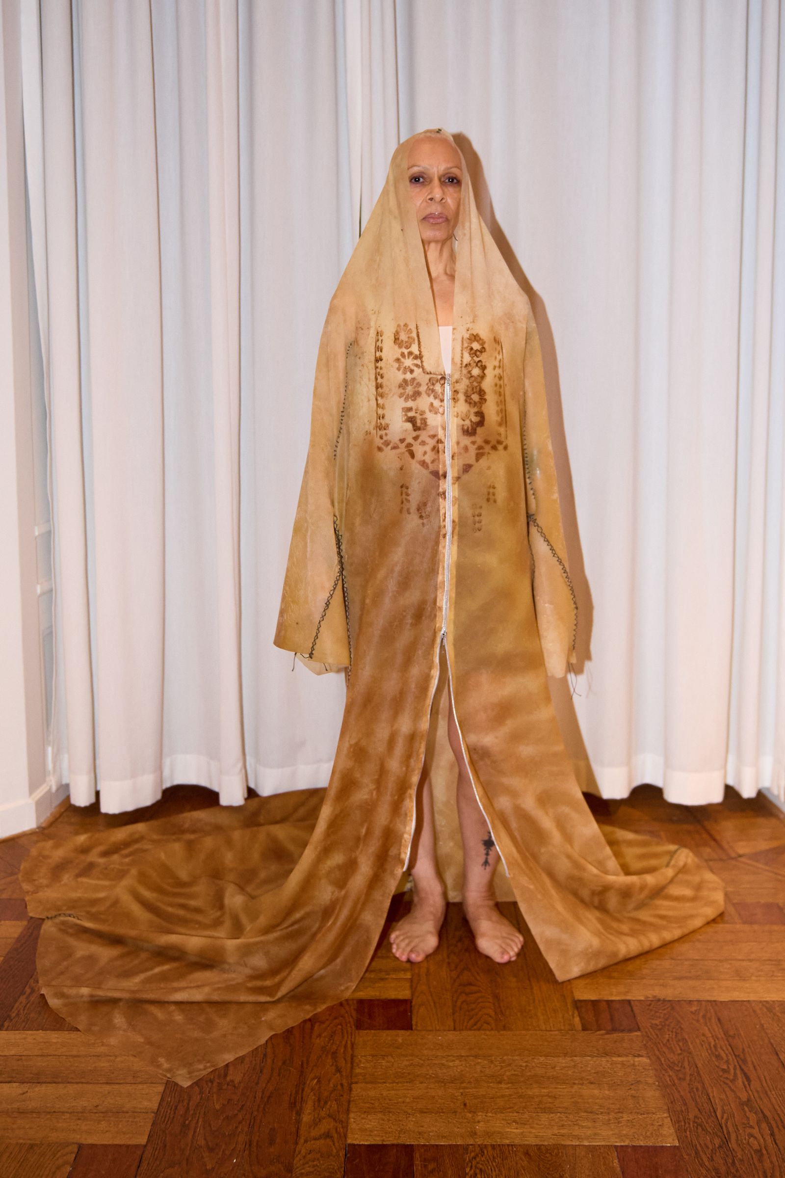 Image may contain Fashion Person Bridal Veil Clothing Dress Formal Wear Gown Wedding Wedding Gown and Robe