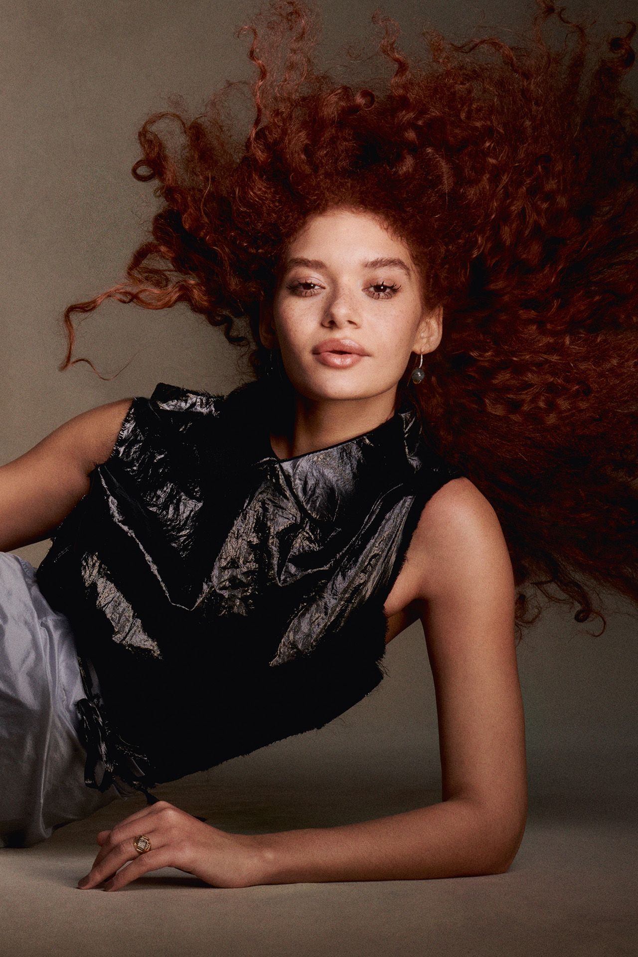 Image may contain Adult Person Hair Face Head Photography Portrait Accessories Jewelry and Ring