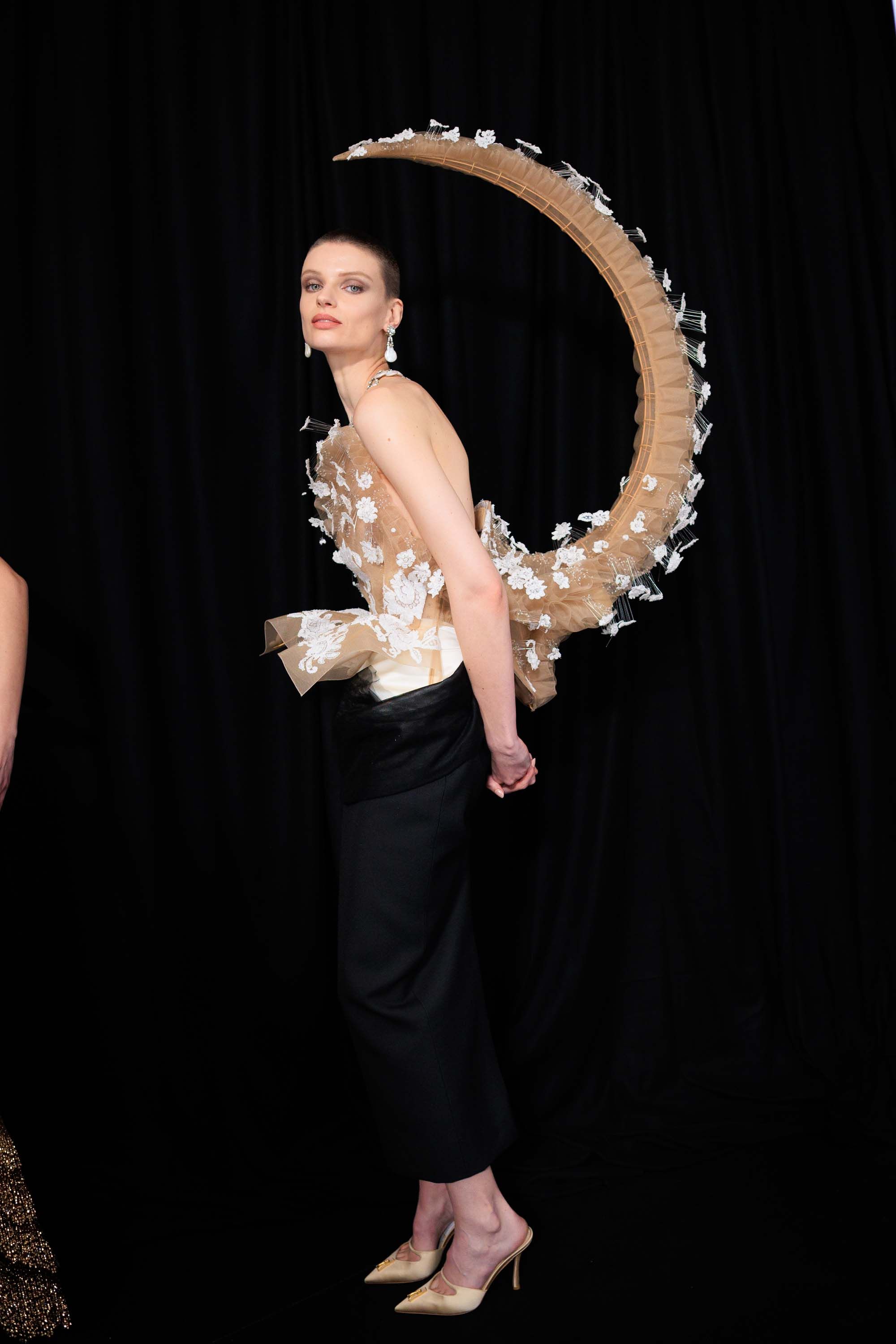 Image may contain Face Head Person Photography Portrait Clothing Dress Evening Dress Formal Wear Adult and Dancing