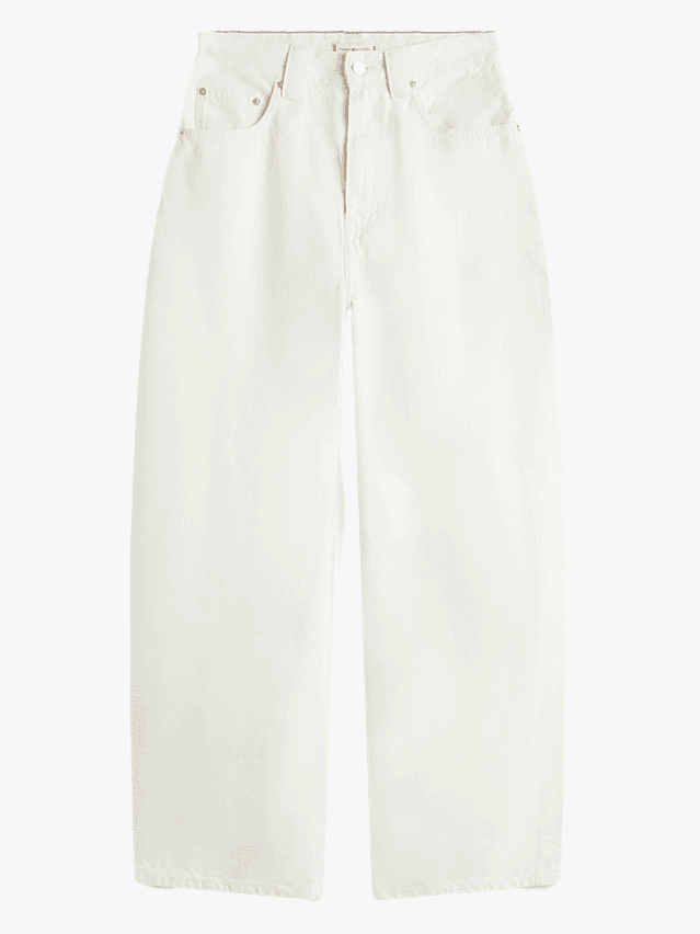 Image may contain Clothing Shorts Home Decor Linen Pants and Coat