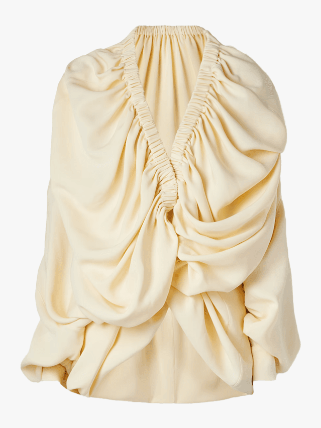 Image may contain: Blouse, Clothing, and Dress