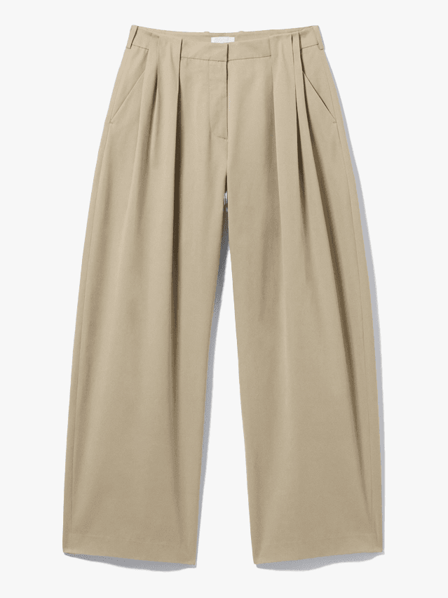 Image may contain Clothing Shorts Khaki Skirt and Pants